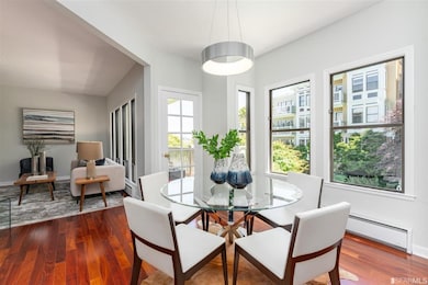 Dining and living areas are awash in natural light.
