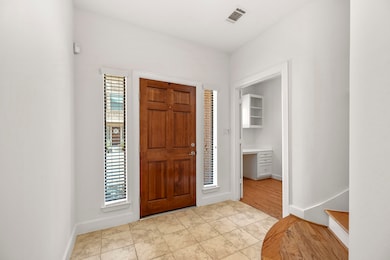 Reverse view of the front door. This area is spaci