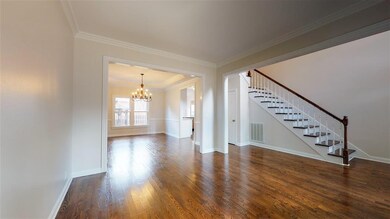 Another view of Living Room open to Dining Room an