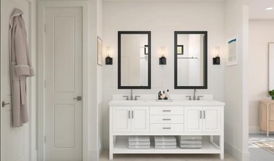 Primary bath with dual sinks and black-framed mirrors