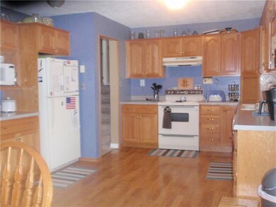 Equipped Kitchen with Oak Cabinets, hardwood floor