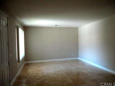 Spacious Living Room with Travertine Flooring