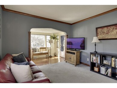 Another view of the living room into the sun room.