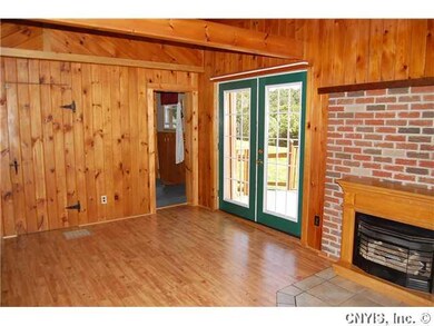 Dining Room Patio doors lead to back deck, gas FP