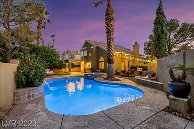 Pool at dusk with a patio, a fenced backyard, and