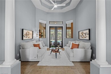 Living area, looking out to pool and lanai. featur