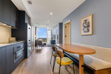 Dining room with light wood finished floors, floo