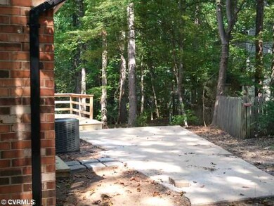 Exterior Back - Large patio with access from maste