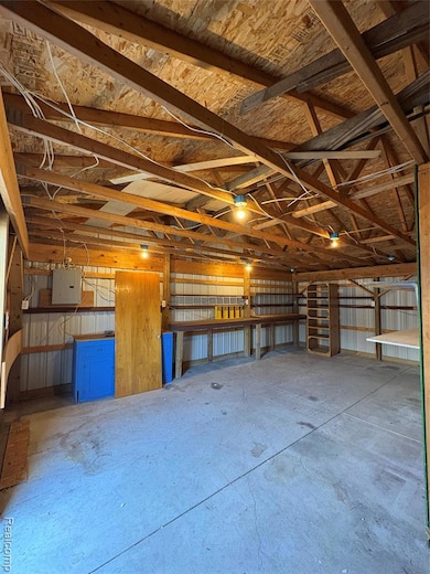 Garage featuring electric panel