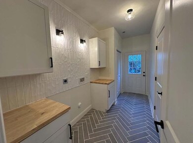 The photos shown are of a previously completed home with the same floor plan. These images are for layout reference only. Finishes, materials, colors, and features may vary and are not representative of the home currently under construction. This is 