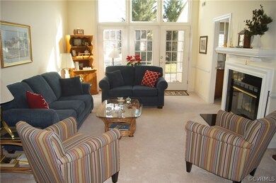 
Gorgeous Great Room W/Wall of Windows!