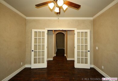 The study is right off the entry with double frenc