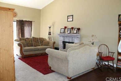 Living room with fireplace and direct access to ba