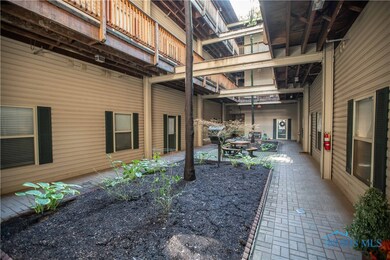 Lobby / common area with open roof and interior ga