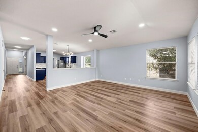 Unfurnished living room with a chandelier, recess