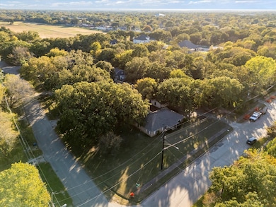 Nice corner lot with lots of mature trees.