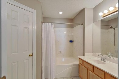 Master bathroom with walk-in closet.