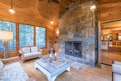 Screened Porch w woodburning fireplace