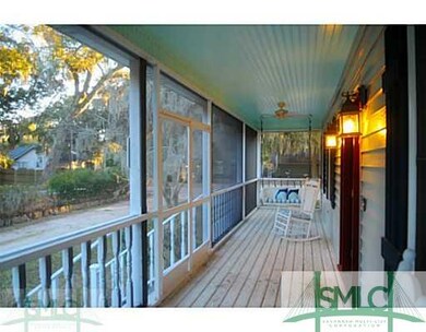 Exterior Front. Huge screen front porch overlooks 