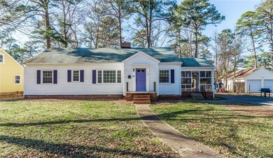 Notice the sidewalk, front stoop, screened porch,