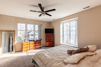 Spacious master bedroom is light filled and includ