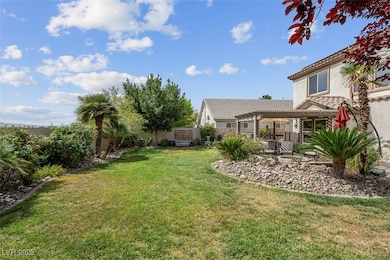 View of yard with a pergola and a patio
