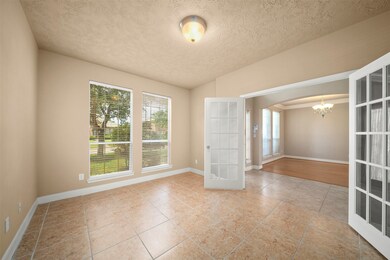 Bright and inviting study with elegant French door