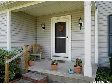 Exterior Front. The steps and sidewalk, to the fro