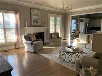 The living room flows to the breakfast room and ki