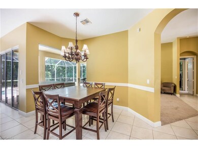Dining room with bay window overlooking lanai