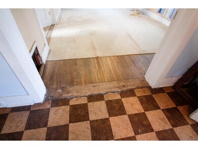 Living room floor has some beautiful original hard