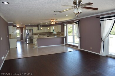 Living/Eat/kitchen with Doors to Deck