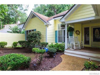 Front of the Home - Aggregate walkway and covered 