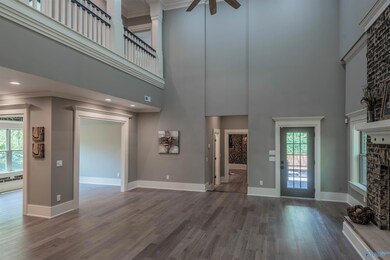 Enjoy the feel and comfort of your massive two-story great room, accented with a large gas fireplace, an open floorplan including the gourmet kitchen, dining room, family living area, and step-down access to the master suite.