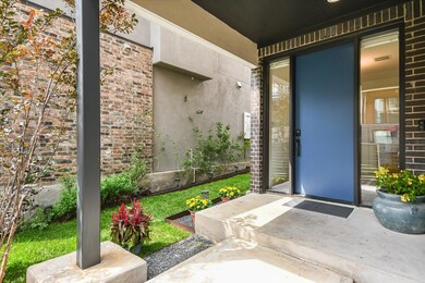 Entrance to property featuring brick siding and v