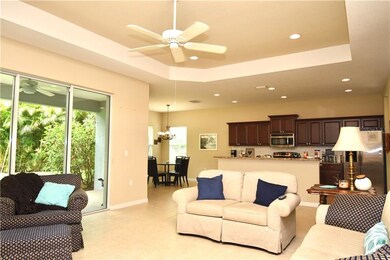 Great room looking back to kitchen and dinette. Sl