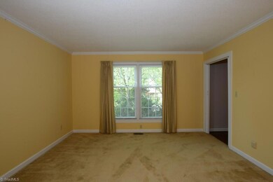 Huge formal living room opens into dining room and foyer....fresh paint
