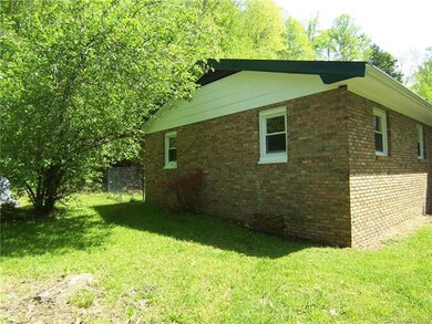Left Side of House with Apple Tree