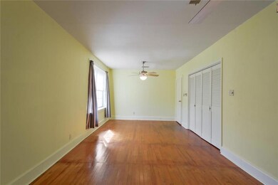 Master bedroom.  Wall was taken down between 2 bed
