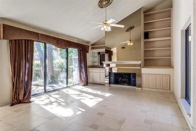 Built ins in shelves and cabinets on either side o