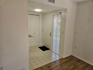 LIVING ROOM LOOKJNG AT FRONT FOYER