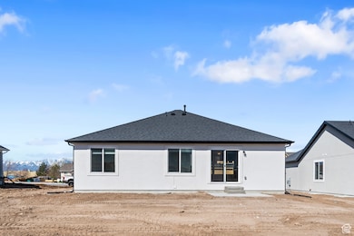 Rear view of property. *Actual exterior will be different than featured photo.