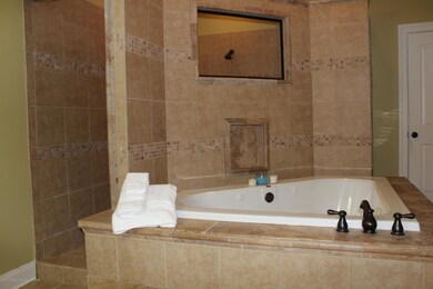 WALK THROUGH SHOWER WITH WHIRLPOOL TUB
