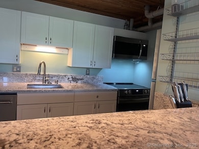Kitchen with Granite and Stainless Steel Appliances