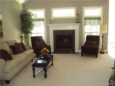 Family Room standard gas fireplace and volume ceil