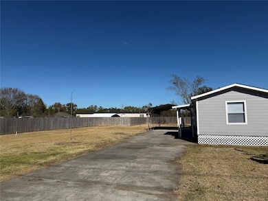 Long driveway with plenty of parking space.