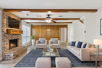 The living room virtually staged so you can imagine the possibilities.