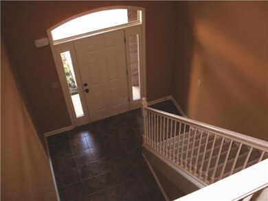 View of the entry and stairway leading to 3rd BR s