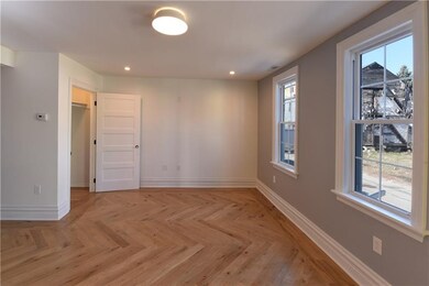 Living room looking out to Peralta Street.