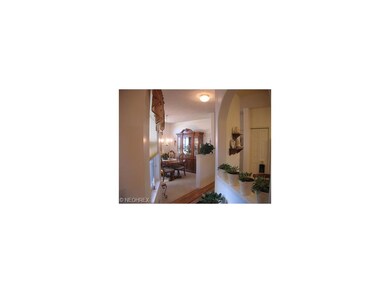 Opening into the dining room and the kitchen.
